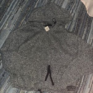 gray long sleeved cropped shirt